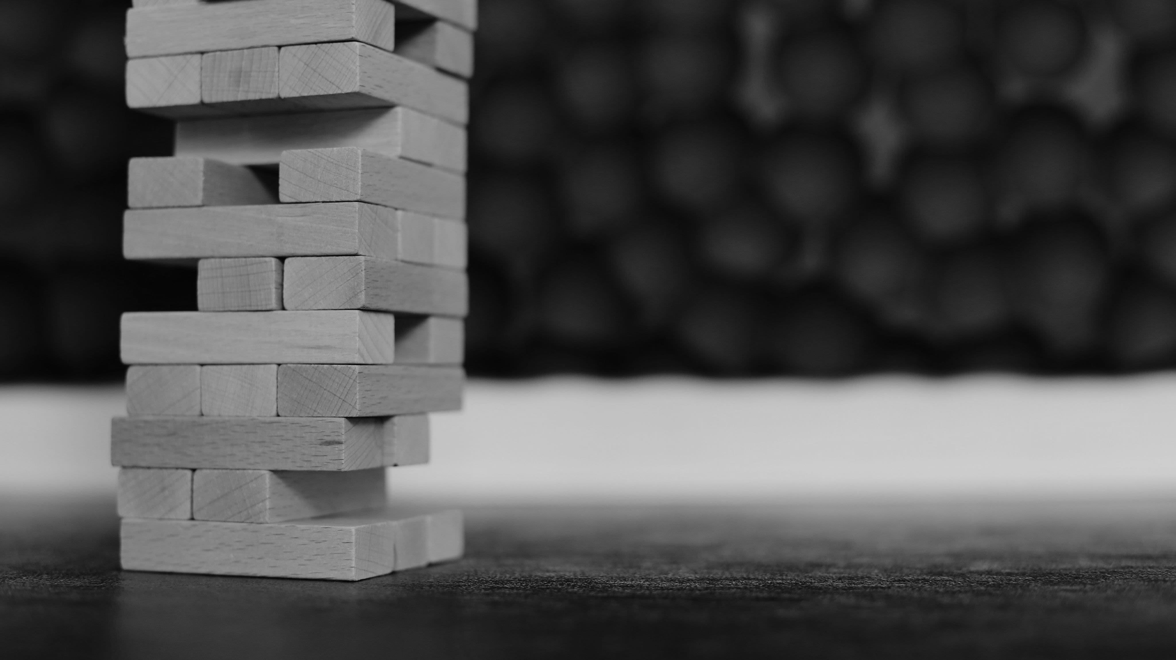 brown wooden blocks on black table